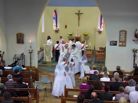The children process to the Altar